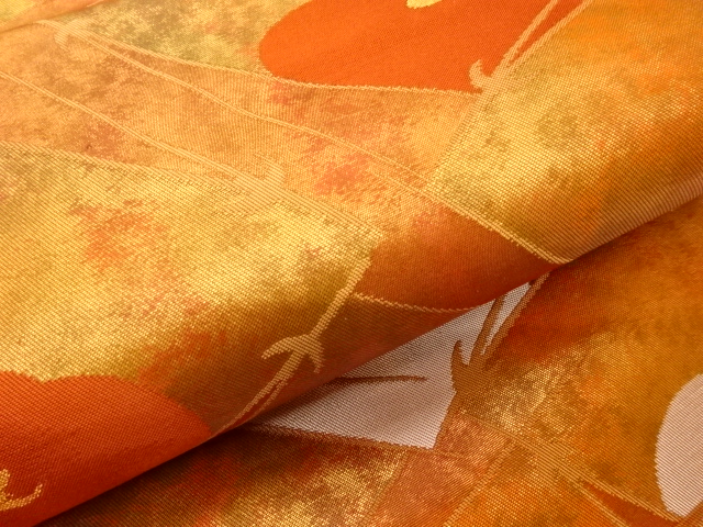  長谷川織物製　引箔松葉・変わり菱に椿模様織出し名古屋帯